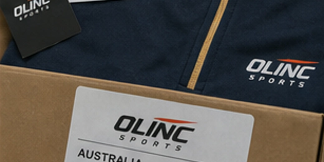 Close-up of Australia GAA kit quote planning with destination city fields, carton count notes, folded teamwear, balls, and sample approval card