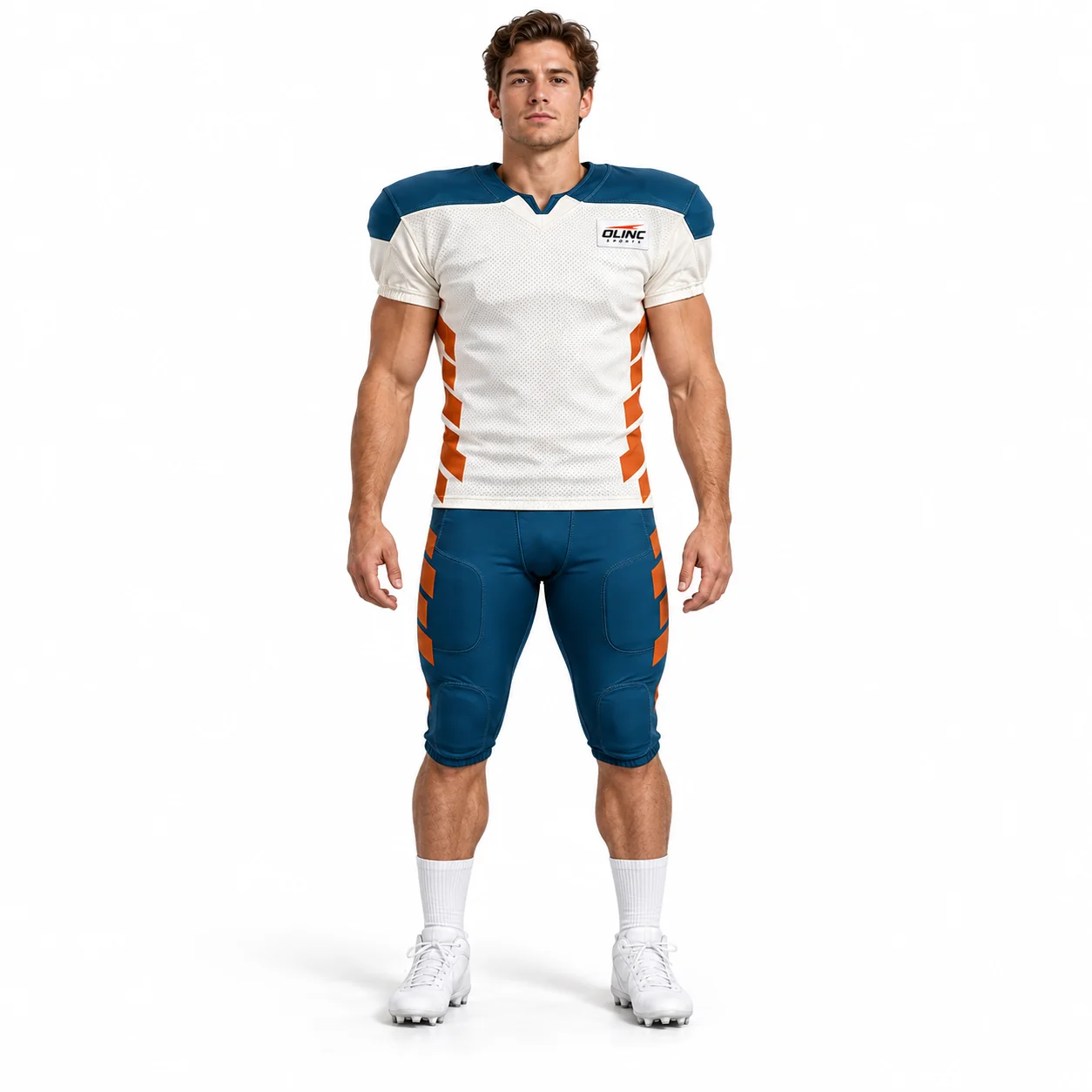 American Football Saddlepoint Set front design view showing bone-white jersey, petrol-blue saddle shoulders and copper angular side panels; petrol-blue pants