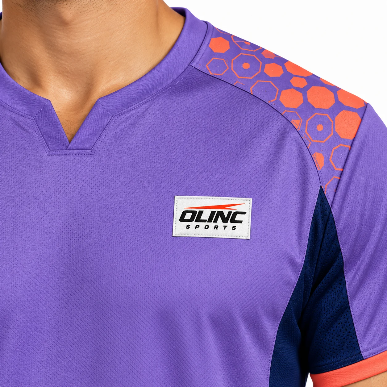 Handball Apex Split-Hem Jersey zoom design view showing deep-lilac body, ink-blue curved underarm panels and coral sleeve-edge binding