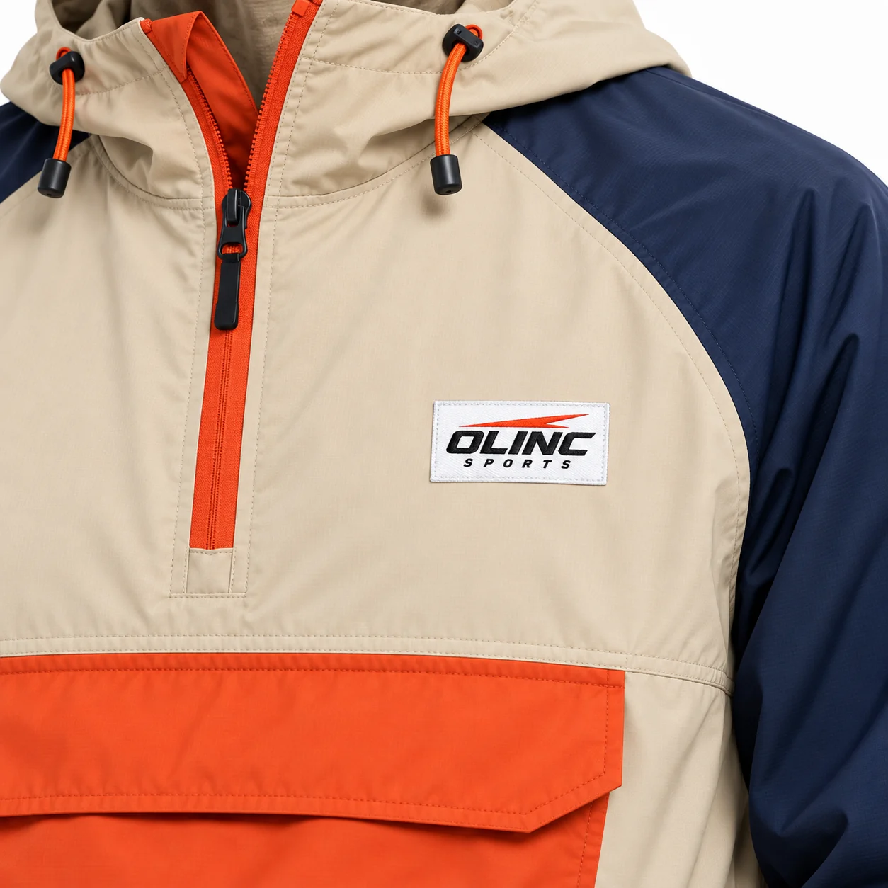 Jacket Waypoint Panel Anorak zoom design view showing sand body, navy raglan sleeves and muted-orange pocket and zip accents