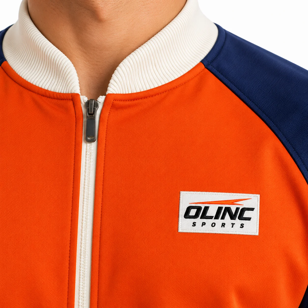 Baseball Meridian Zip Warmup zoom design view showing burnt-orange torso, navy raglan sleeves and ivory rib trims