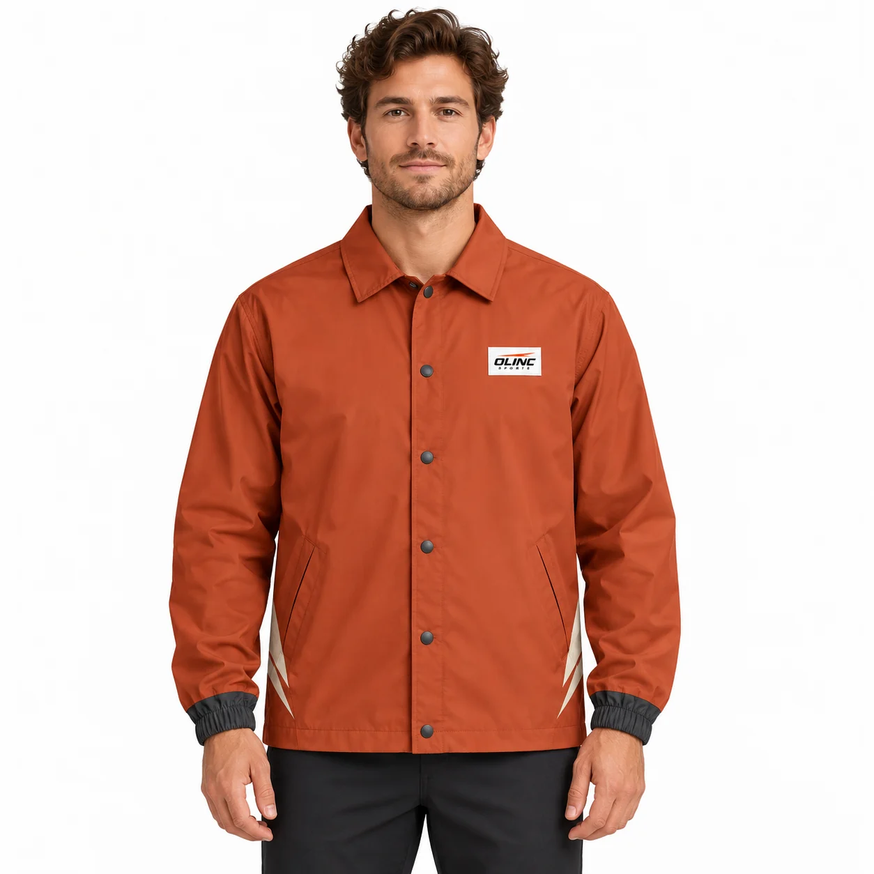 Jacket Drift Snap Coach Shell front design view showing terracotta body, ivory rear storm-yoke panel and charcoal cuffs