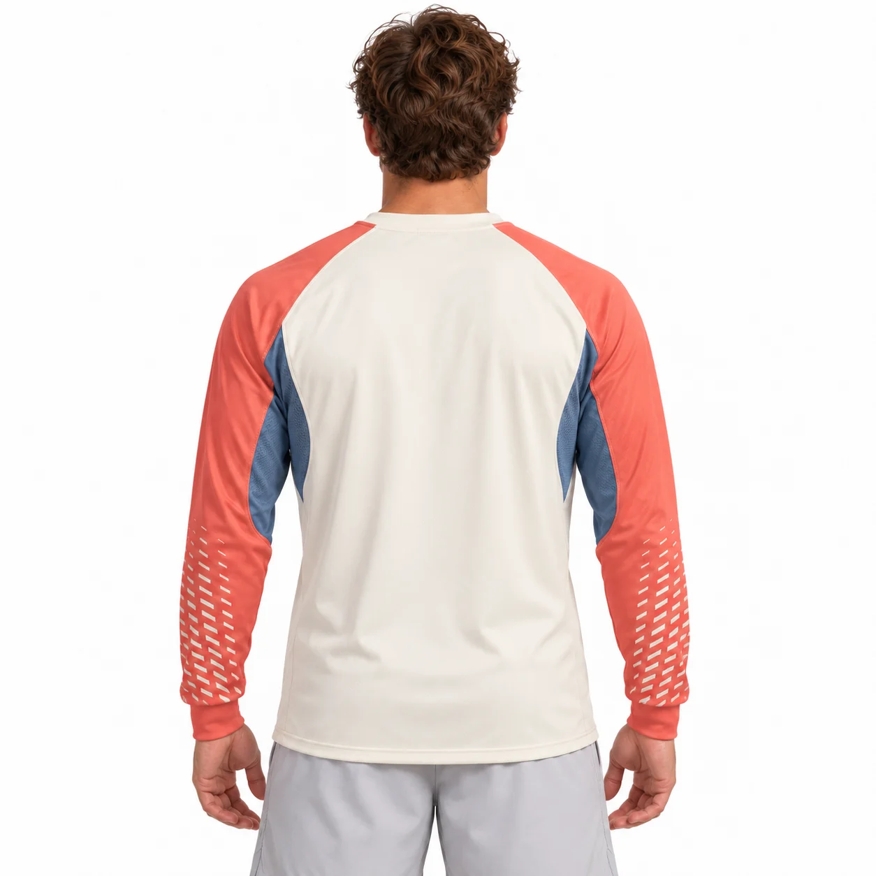 Lacrosse Stratum Long-Sleeve Top back design view showing cream body, muted-coral raglan sleeves and cadet-blue curved underarm inserts