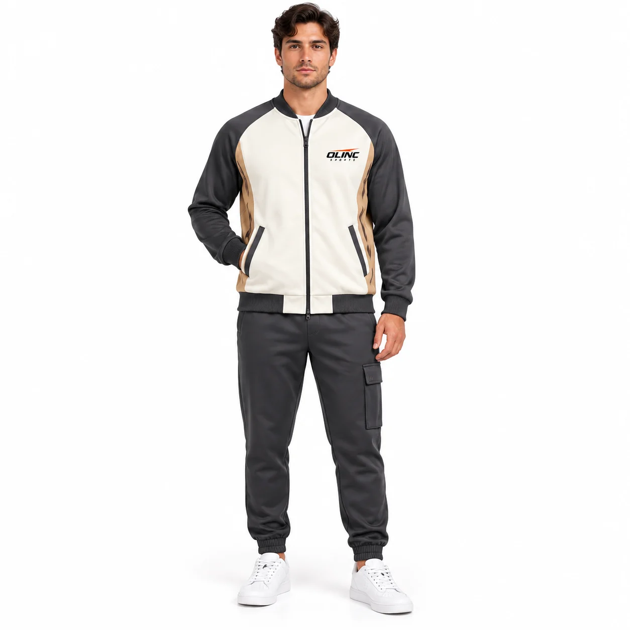 Tracksuit Station Rib-Collar Set front design view showing ivory bomber-style jacket, charcoal sleeves and tan side inset panels; charcoal cuffed cargo trousers
