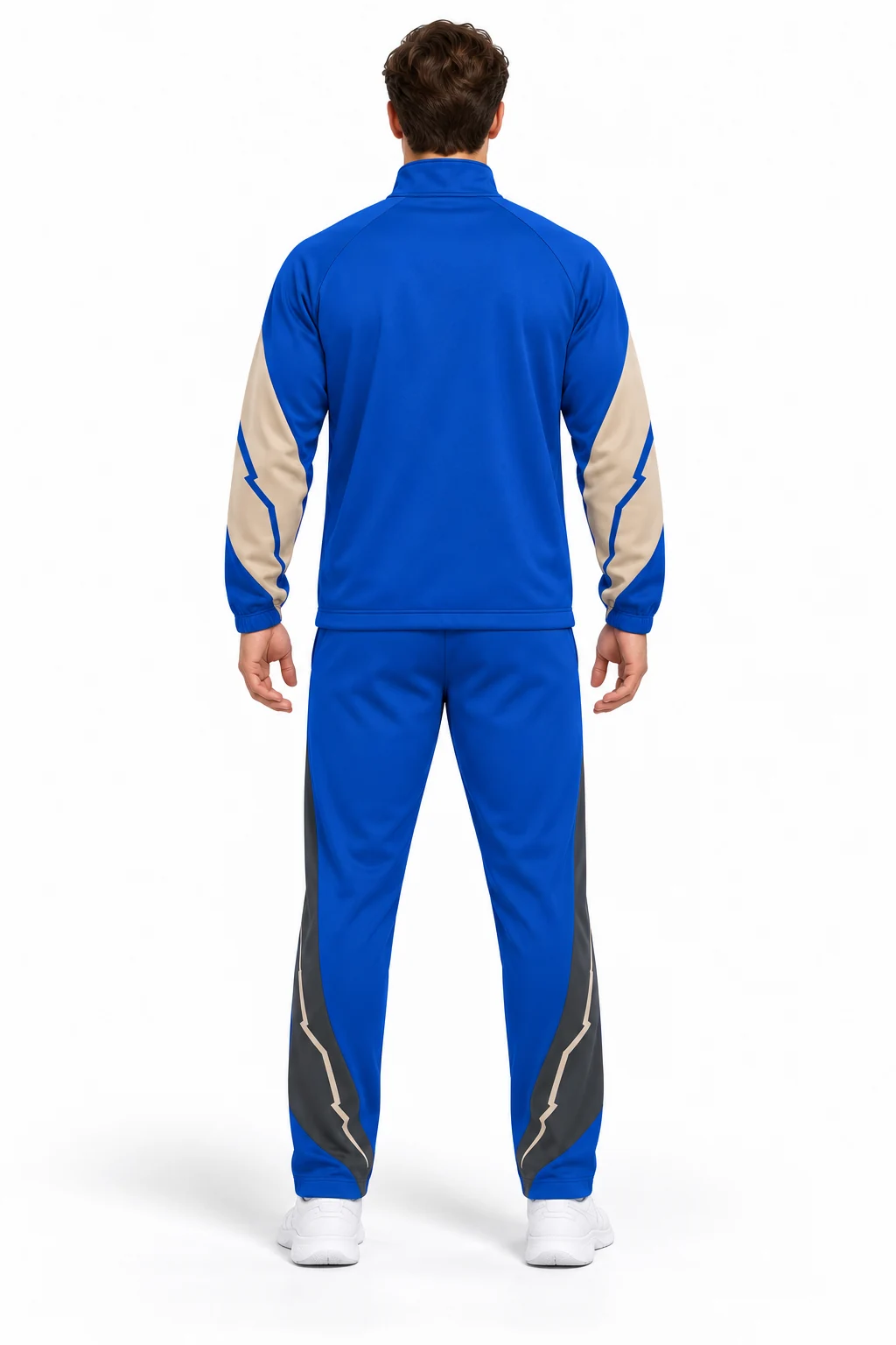 Basketball Concourse Warmup Set back design visualization: cobalt body, sand curved elbow inserts and charcoal trouser panels