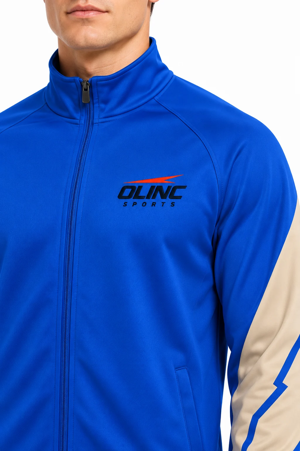Basketball Concourse Warmup Set zoom design visualization: cobalt body, sand curved elbow inserts and charcoal trouser panels