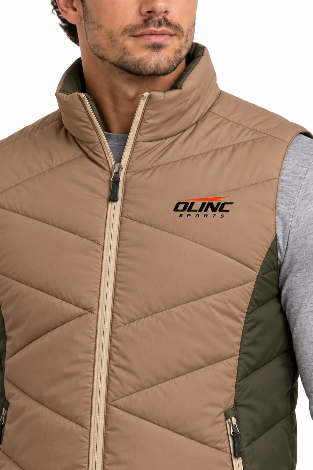 Jacket Quarry Angled-Baffle Vest zoom design visualization: muted clay body, dark olive side panels and pale sand zip tape