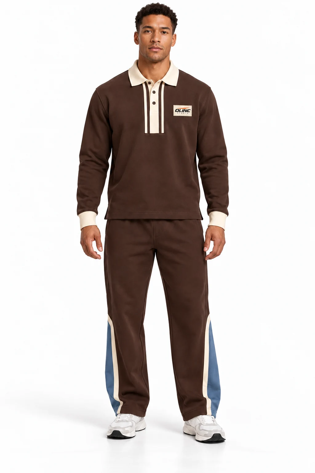 Tracksuit Commonroom Polo Set front design visualization: deep chocolate body, cream collar and cuffs with muted blue lower-leg panels