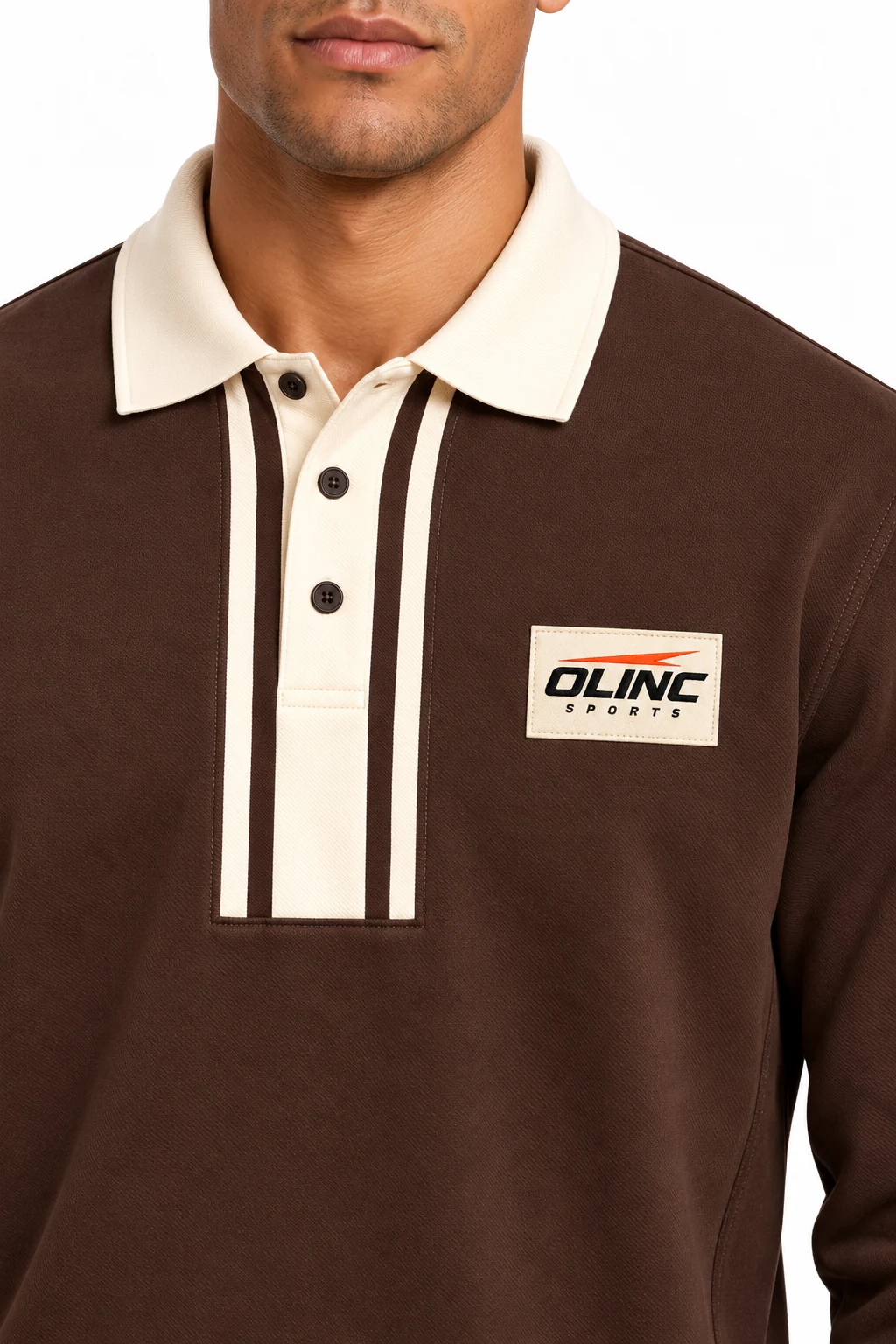 Tracksuit Commonroom Polo Set zoom design visualization: deep chocolate body, cream collar and cuffs with muted blue lower-leg panels