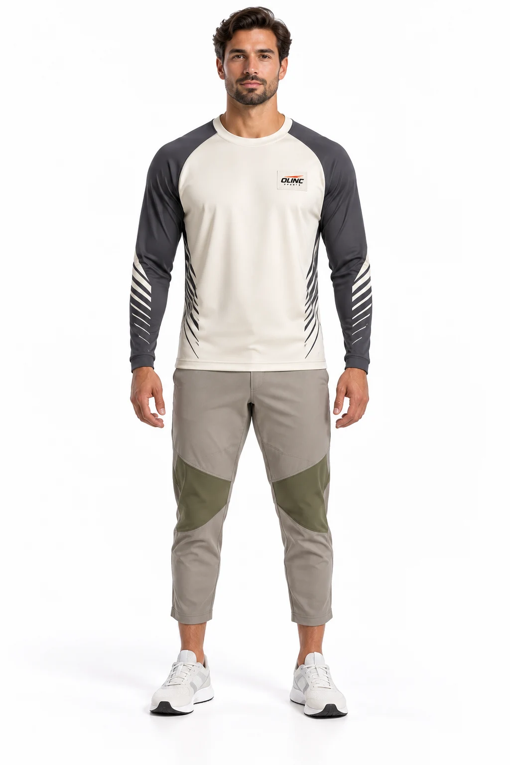 Cricket Creasework Training Kit front design visualization showing ivory shirt, graphite raglan sleeves and warm gray cropped trousers with moss knee panels