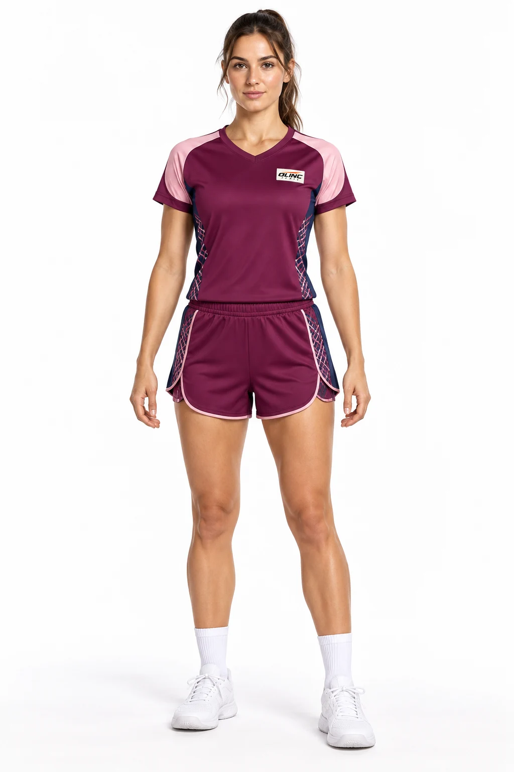Handball Crossweave Womens Set front design visualization showing deep berry shirt and shorts, pale pink shoulder inserts and navy side panels