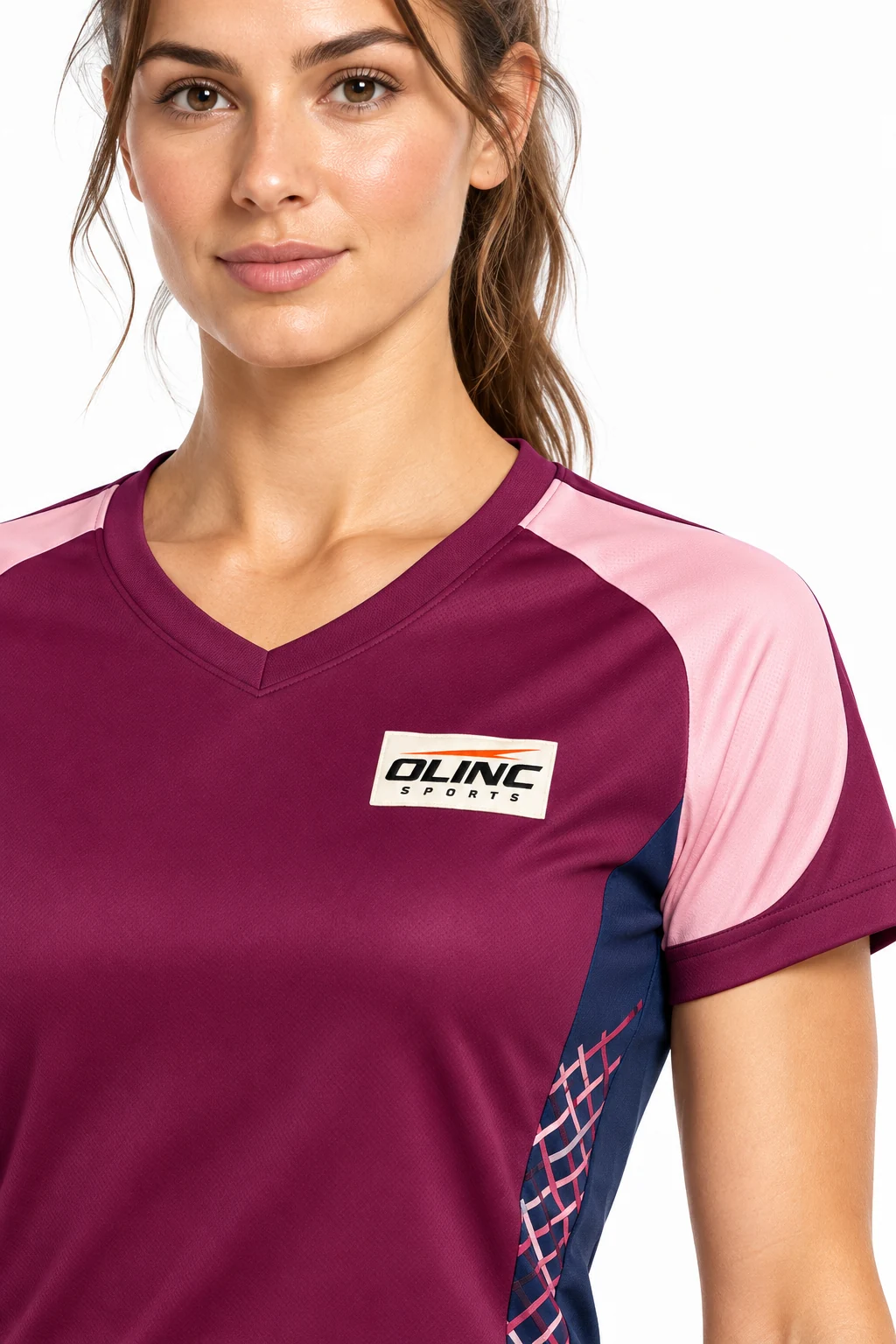 Handball Crossweave Womens Set zoom design visualization showing deep berry shirt and shorts, pale pink shoulder inserts and navy side panels
