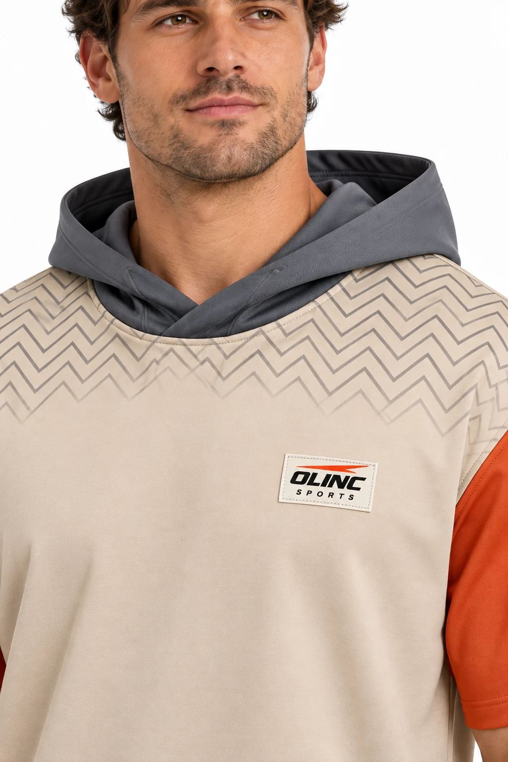 Lacrosse Outrider Hooded Warmup zoom design visualization showing warm sand body, slate hood and burnt orange sleeve panels