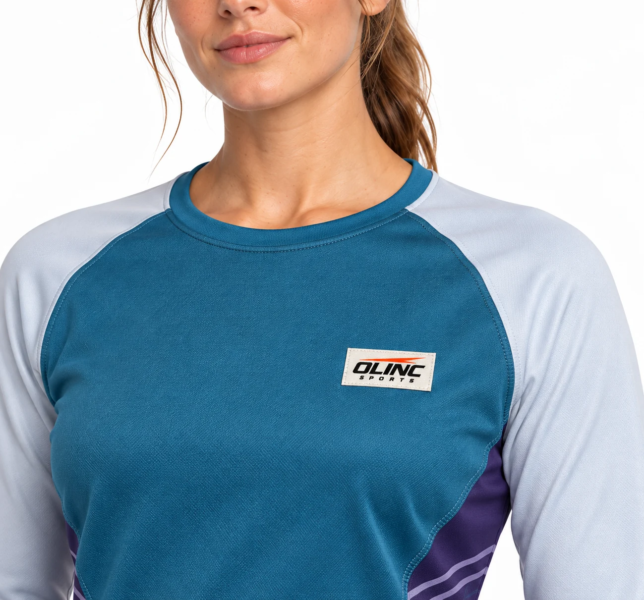Rugby Estuary Womens Training Top zoom design visualization showing ocean teal body, pale mist sleeves and deep violet waist panels