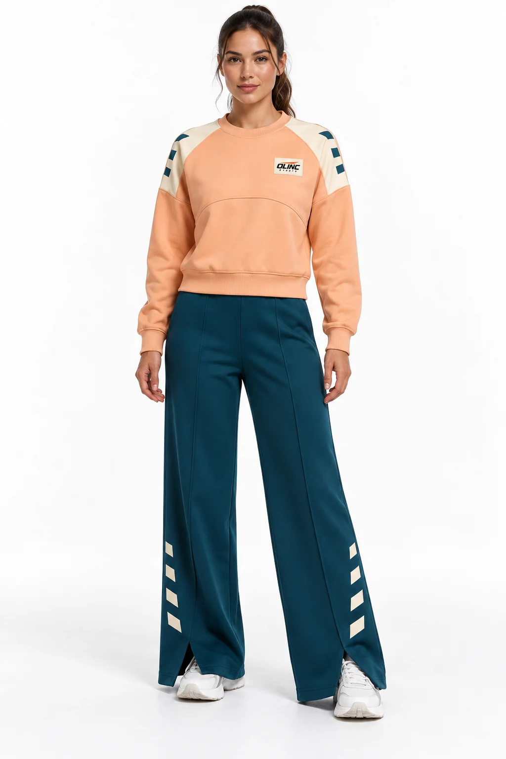 Tracksuit Boardwalk Wide-Leg Set front design visualization showing soft apricot top, deep petrol wide-leg trousers and pale cream shoulder panels
