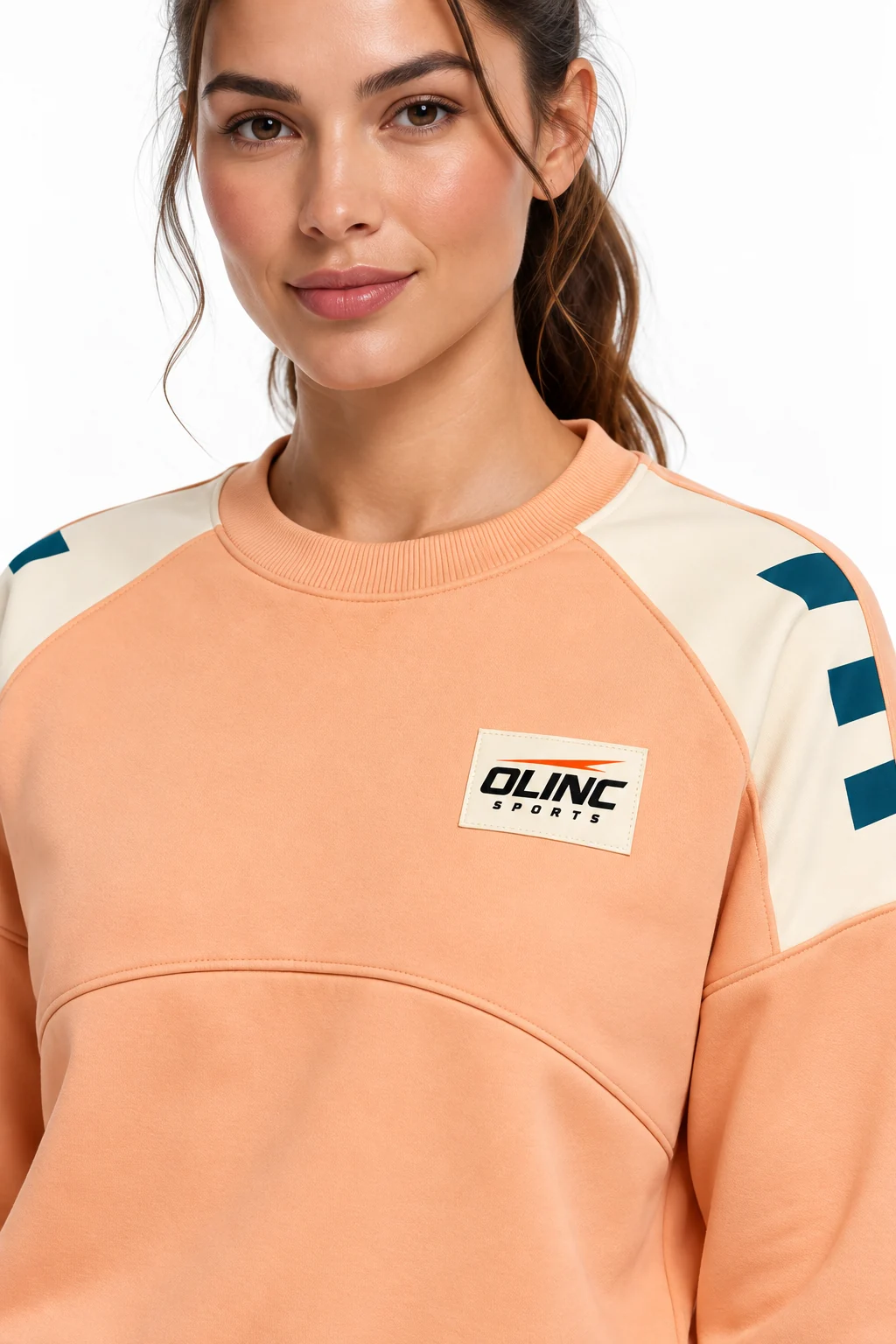 Tracksuit Boardwalk Wide-Leg Set zoom design visualization showing soft apricot top, deep petrol wide-leg trousers and pale cream shoulder panels