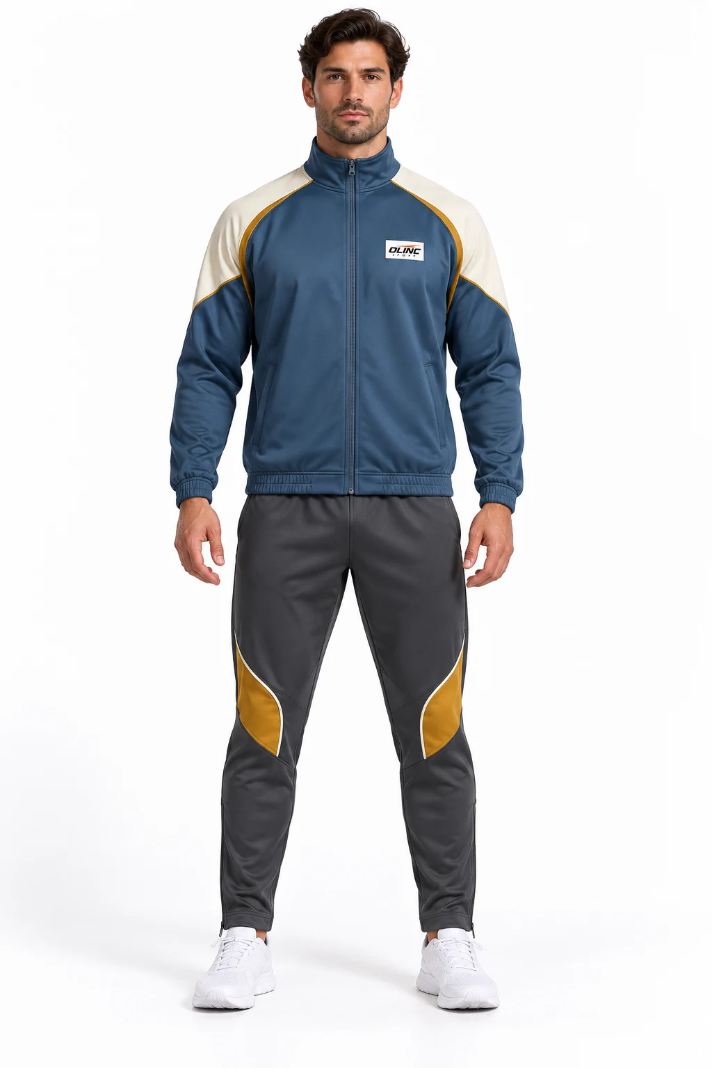 Handball Turnover Warmup Set front design visualization showing steel blue jacket, cream shoulder panels and charcoal trousers with ochre knee inserts