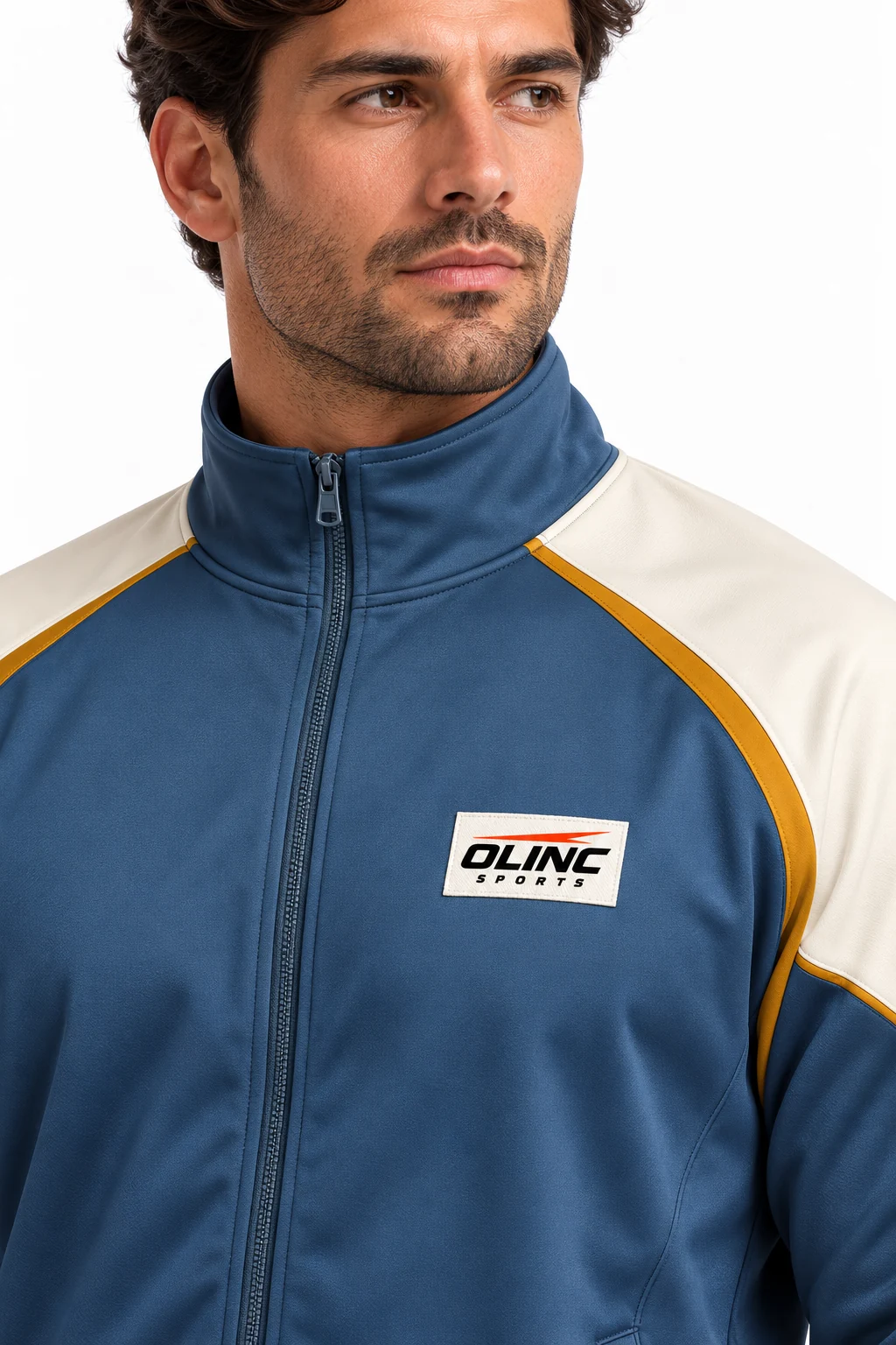 Handball Turnover Warmup Set zoom design visualization showing steel blue jacket, cream shoulder panels and charcoal trousers with ochre knee inserts