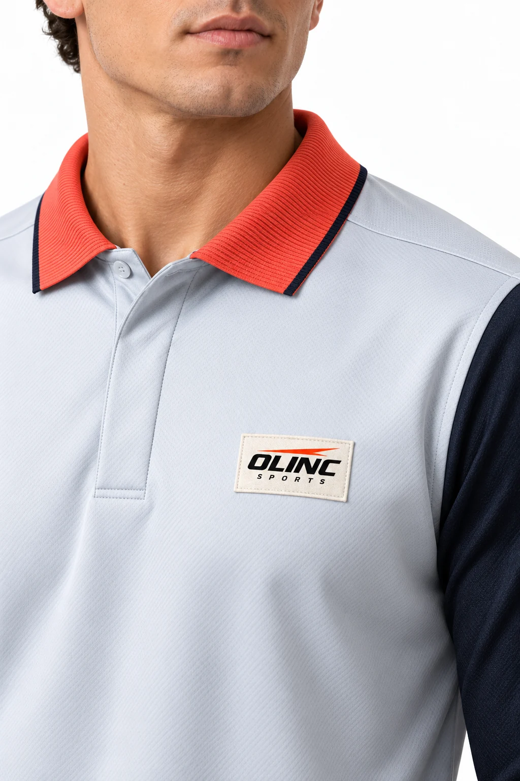 Esports Knotline Long-Polo Jersey zoom design visualization showing pale ice gray body, deep ink sleeves and muted coral collar rib accents