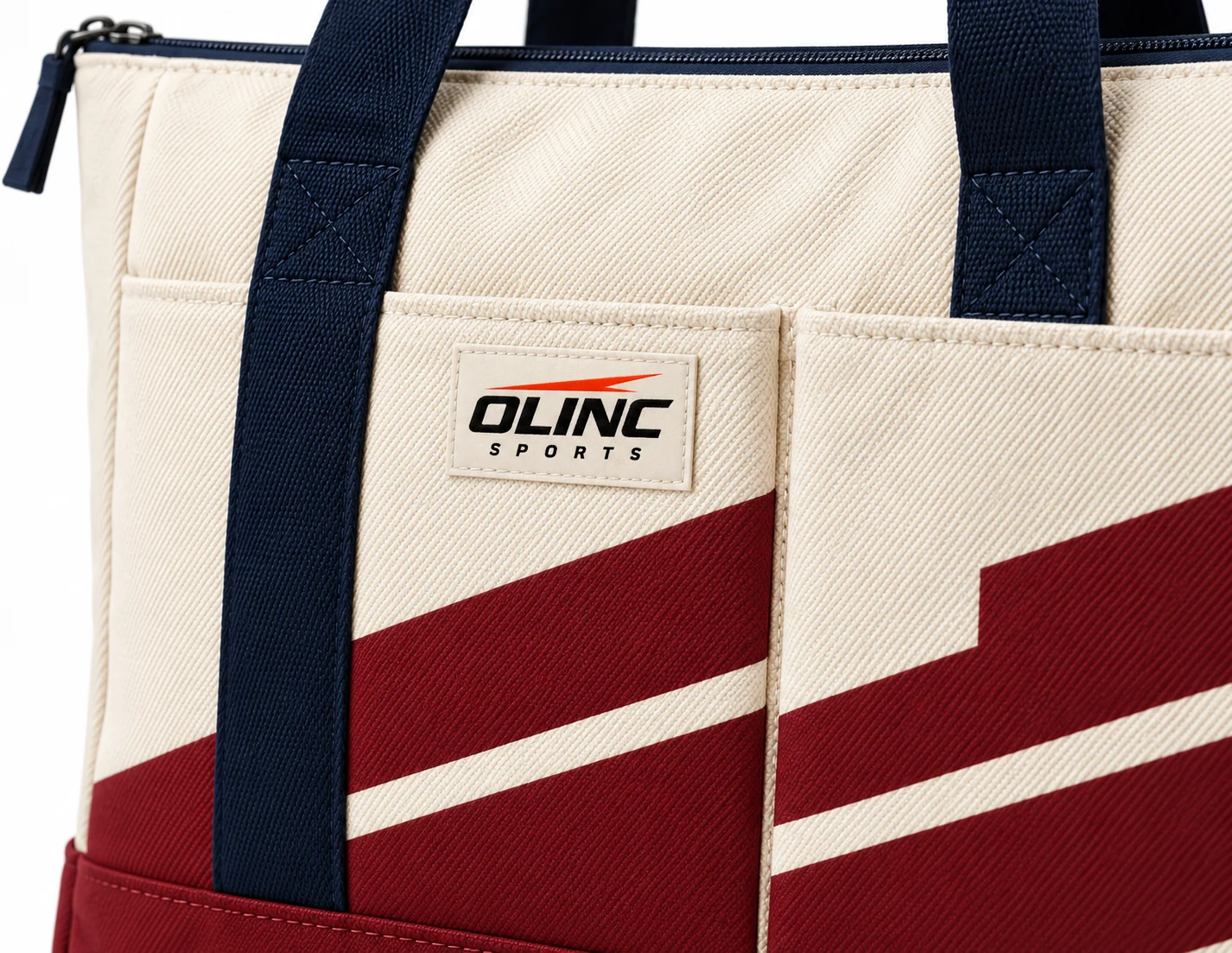 Bag Archive Zip Team Tote zoom design visualization of cream woven-look body, oxblood boxed base and dark navy webbing