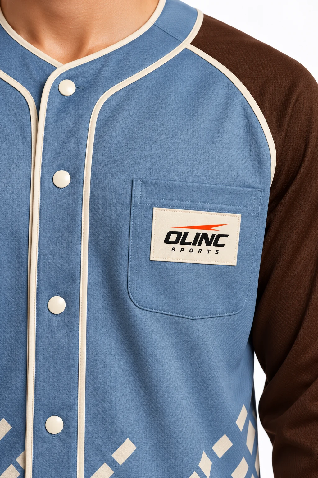 Baseball Infield Long-Snap Jersey zoom design visualization of dusty blue body, deep brown sleeves and warm ivory trim