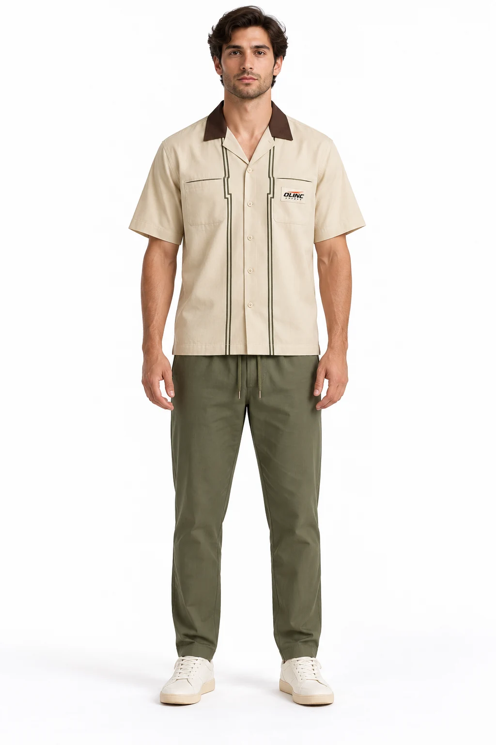 Cricket Pavilionwalk Travel Set front design visualization of pale sand shirt, muted olive trousers and dark brown collar facing