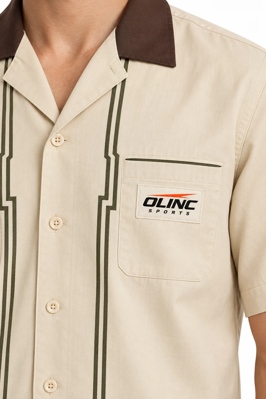 Cricket Pavilionwalk Travel Set zoom design visualization of pale sand shirt, muted olive trousers and dark brown collar facing