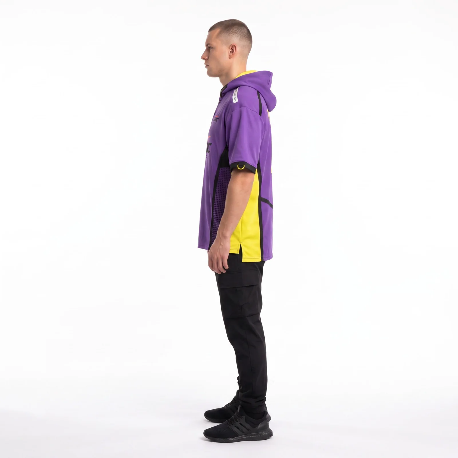 Side view of the techwear jersey hoodie showing the scuba hood, drop shoulder, cuff, and split hem