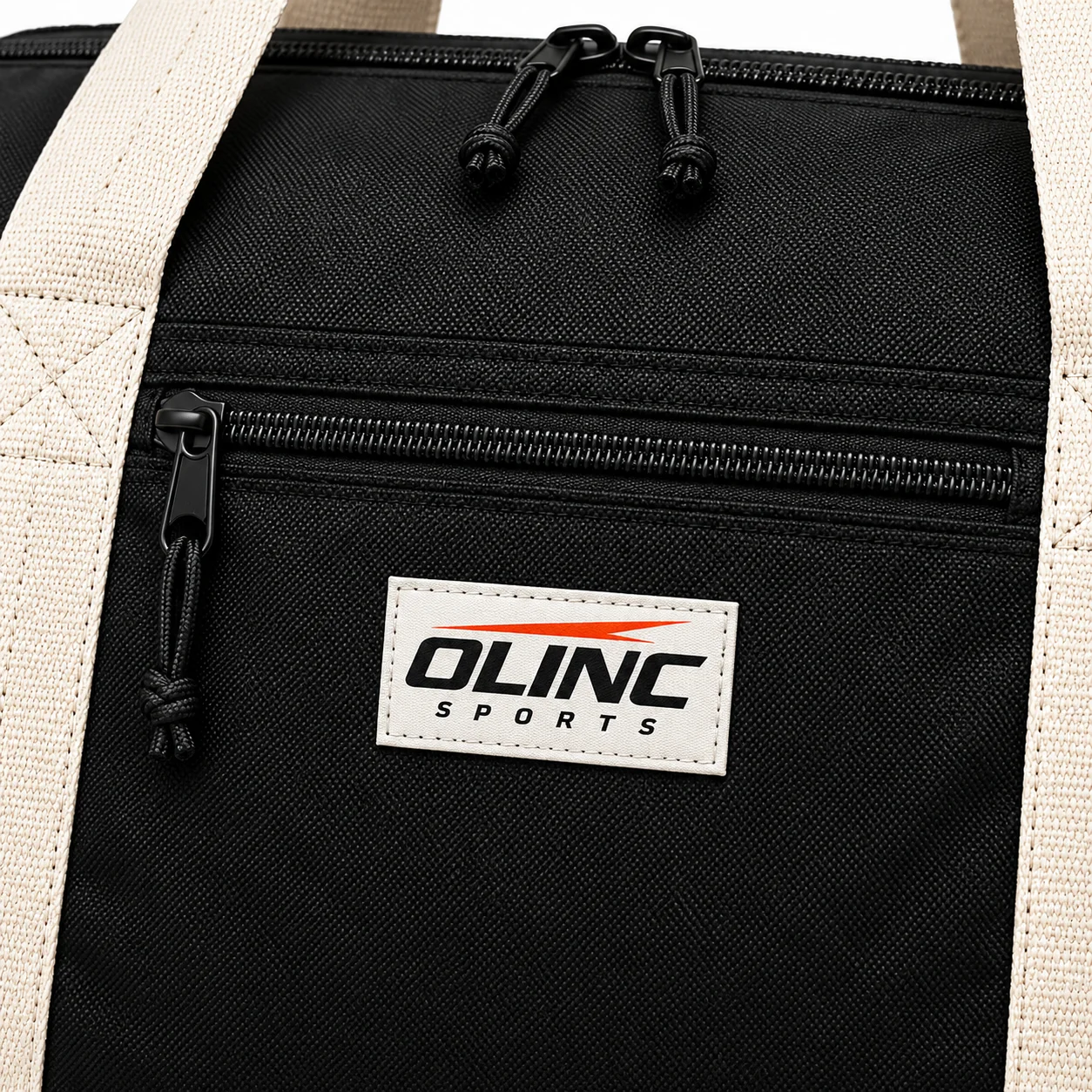 Awayday Team Duffel zoom design view showing black shell, forest-green end panels and cream carry handles