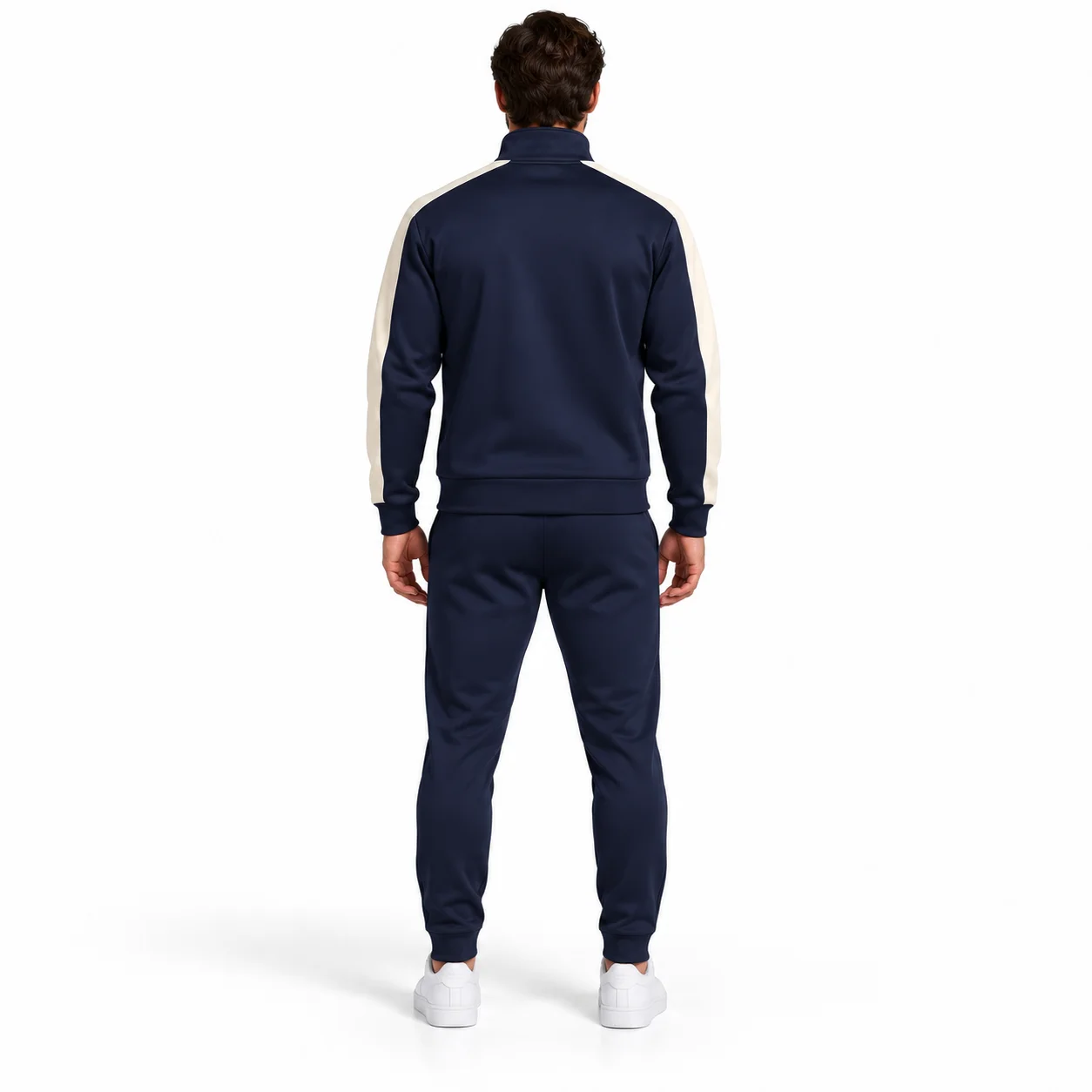 Transit Scuba Tracksuit back design view showing midnight-navy set with cream sleeve inserts and tonal hardware